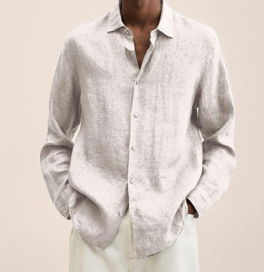Camicia di lino bianca da uomo, maniche lunghe, stile casual elegante, perfetta per look estivi e primaverili. Tessuto leggero e traspirante.