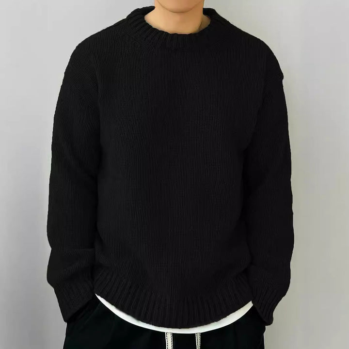 Maglione nero uomo, stile casual, lavorato a maglia, collo rotondo, maniche lunghe, perfetto per autunno e inverno, moda maschile elegante.
