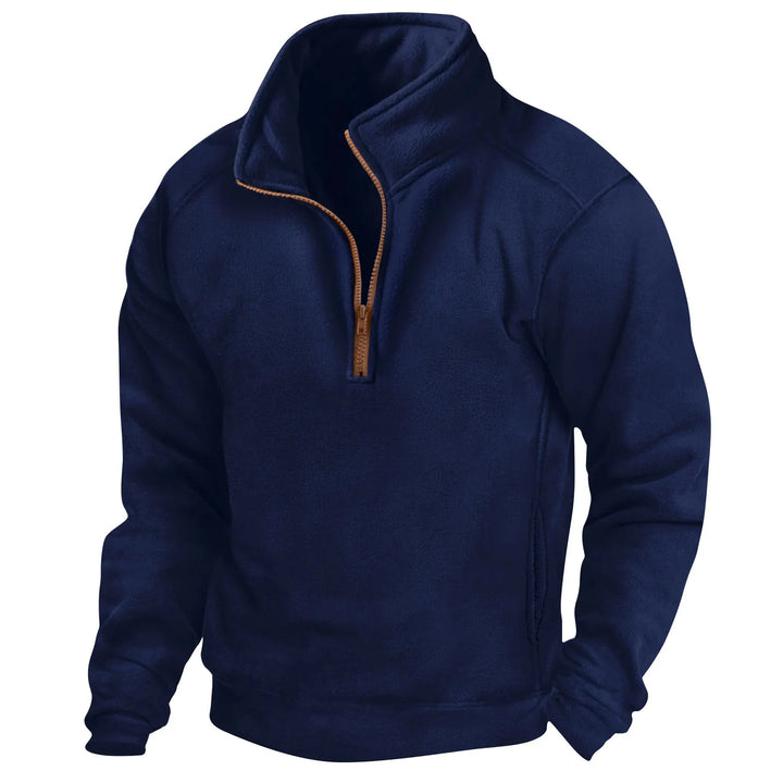 Felpa in pile blu navy con zip a metà, design casual e caldo, ideale per l'inverno. Abbigliamento uomo, moda autunno-inverno, comfort e stile.